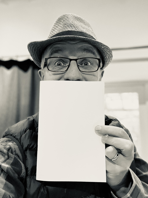 Richard Coan with 'ours' poetry book